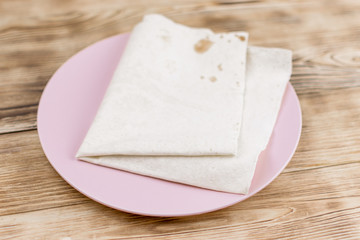 Armenian bread - lavash on the wood background