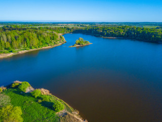 Fototapeta na wymiar Aerial landscape of small island at the lake