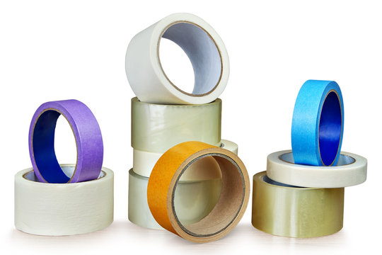 Several rolls of adhesive tape for different purposes on white.