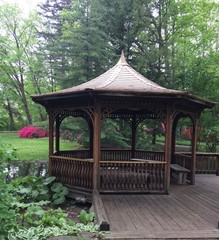 wooden gazebo in garden