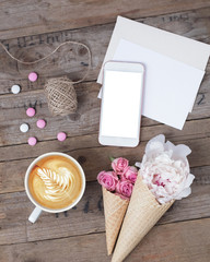 Morning routine with coffee and phone
