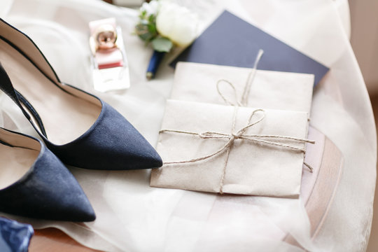 Wedding morning. Blue beautiful bride shoes- wedding details. close up view womans accessories.