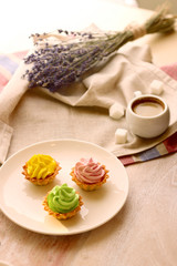 basket with cream. cake on plate. morning light. tasty breakfast