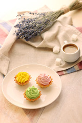 basket with cream. cakes on plate. delisious breakfast