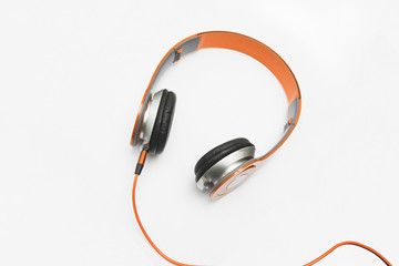 Orange headphone on white