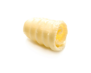 Fototapeta na wymiar Fresh butter curl on white background