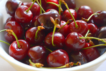 cherries in a plate on the table