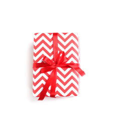 Obraz premium Beautifully decorated gift box on white background, top view