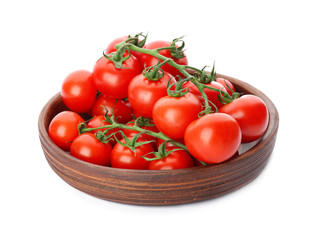 Wooden plate with fresh ripe tomatoes on white background