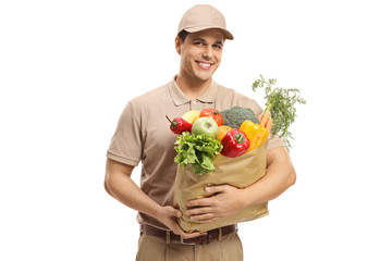 Delivery guy holding a bag of groceries