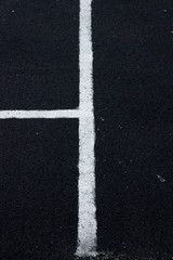 Lines on an asphalt field for sports