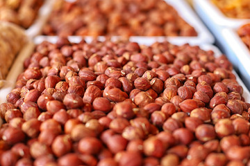 Hazelnut on the counter in the store. Raw nuts, vegetarian and diet food. With a soft focus.