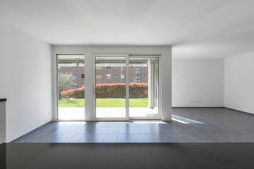 Fototapeta premium Modern apartment with large, bright windows