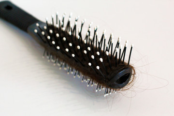  Comb with stuck hair, hair loss