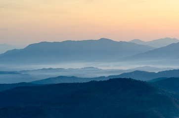 Beautiful clouds and fog among mountain landscape.