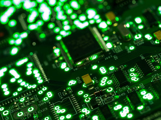 Abstract background,close up green circuit board. Electronic computer hardware technology. Main...