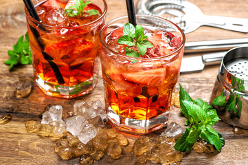 Red drink strawberry mint leaves ice Cocktail making bar accessories