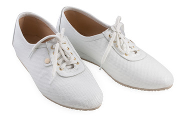 Pair of women's sport shoes isolated on a white background, close up.