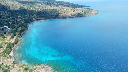 Aerial drone bird's eye view photo of port and traditional fishing village of Perdika in island of Aigina, Saronic Gulf, Greece