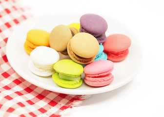 Fototapeta na wymiar Colorful macaron cookies on white background, copy space. select focus