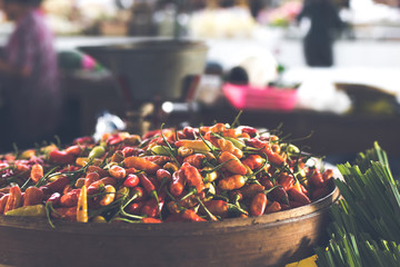 Organic red hot chilli peppers for sale on a local market of Bali island.