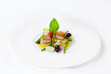 Salad Nicoise with tuna on a white plate