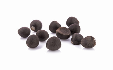 Fototapeta na wymiar dried tea seeds isolated on white bacground