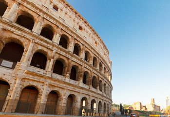 Fototapeta premium Colosseum at sunset in Rome, Italy