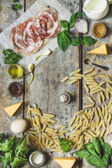 set of ingredients for pasta with creamy sauce  (a penne with creamy sauce and pancetta) - (meal) - cuisine.  Food background