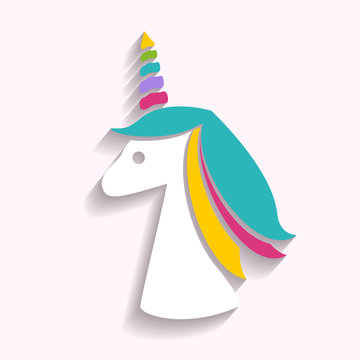 a paper unicorn on the light background