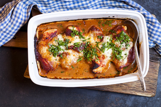 Baked chicken breast with tomato sauce and mozzarella