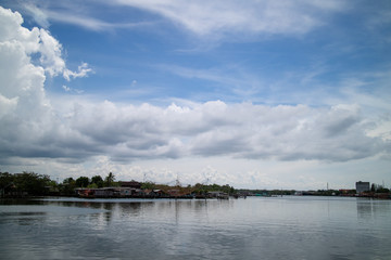 Rivers sky with clouds background