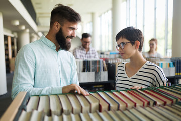 Young woman and man studying for an exam