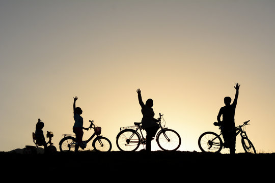 family group cycling and pleasant driving