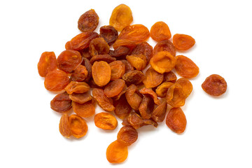 orange dried apricots close up on a white background