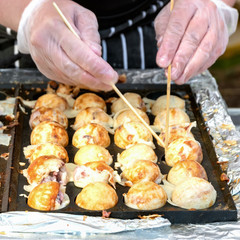 Process to Cooking Takoyaki on hot pan Famous food Osaka Japan street food