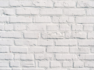 Loft styled white painted brick wall 