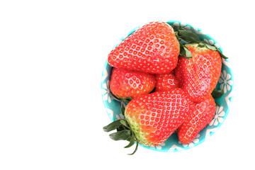 close up bowl with Ripe strawberries isolated on white background.Top view