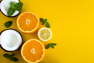 Tropical fruits on the yellow  background.Top view.