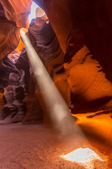 Upper Antelope Slot Canyon showing a light beam into the canyon.