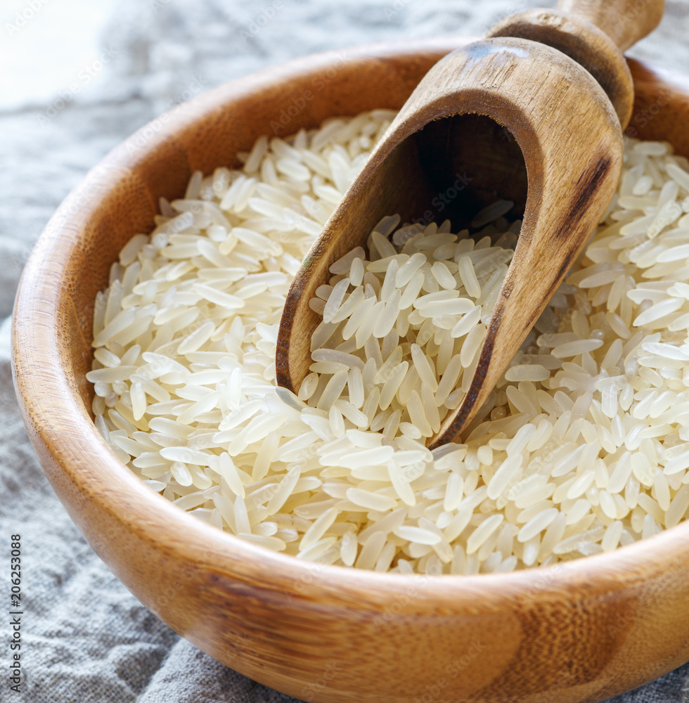 Wall mural Steamed long rice in a bowl close-up.