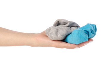 Socks in hands on a white background isolation