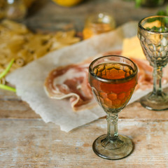 liqueur in a glass on a wooden table (wine) - (celebration) - drink cuisine.  Food background