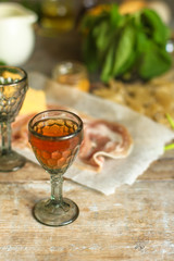 liqueur in a glass on a wooden table (wine) - (celebration) - drink cuisine.  Food background