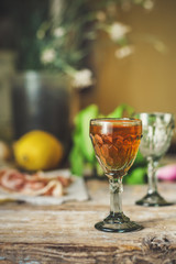 liqueur in a glass on a wooden table (wine) - (celebration) - drink cuisine.  Food background