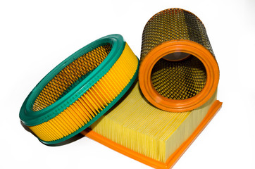 Air filter of the engine - paper, felt or other air purifying element preventing dust and particles...