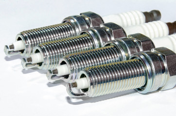 A spark plug is a device for igniting a fuel-air mixture in a wide variety of thermal engines. A...