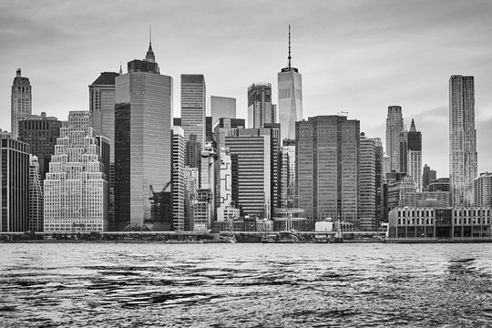 Black and white picture of the Manhattan skyline at sunset, New York City, USA.