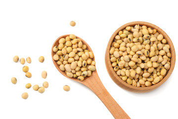 Soybeans in wooden bowl isolated on white background. top view