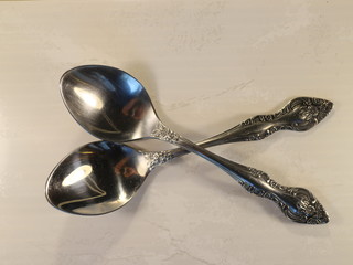 two metal tablespoons